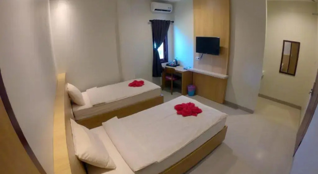 Sunnyday Inn Merauke, Rezerwuj Hotel Hotele w Merauke z parkingiem, Parking