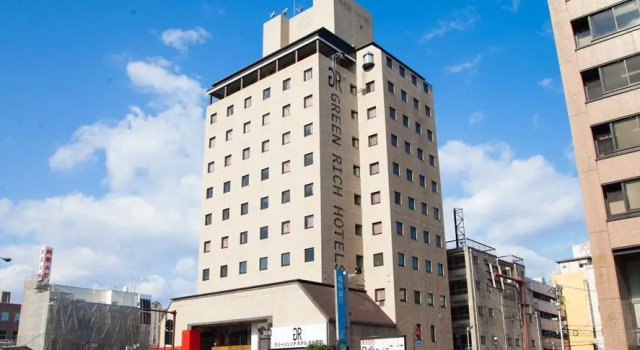 Кровать в общем номере Green Rich Hotel Oita Miyakomachi