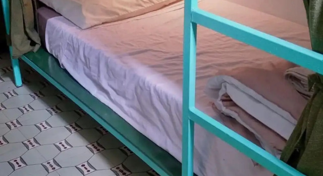 Кровать в общем номере Youki Haus Hostel