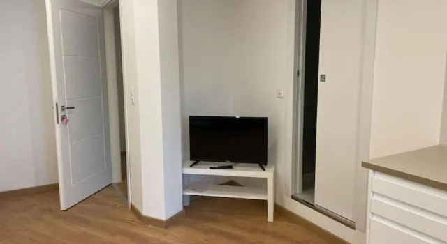 Appartamento con piscina e sauna Bissone, Забронировать Апартаменты/квартира Биссоне Лугано