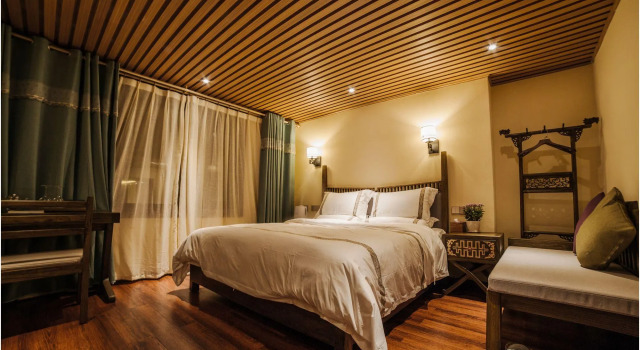 Blossom Dynasty Inn, Buchen Sie Hotel Hotels in Yunnan mit Parkplatz, Parkplätze
