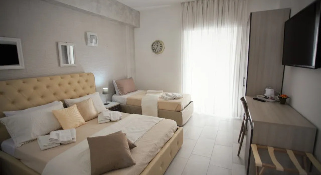 Camera tripla Deluxe con balcone Central Apartments