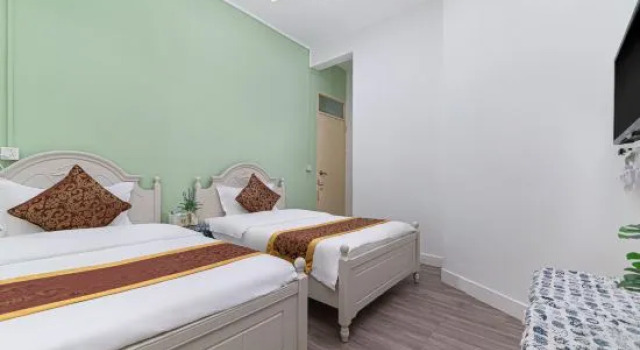 Кровать в общем номере с 6 комнатами Xiaoye Inn Xichong Shenzhen
