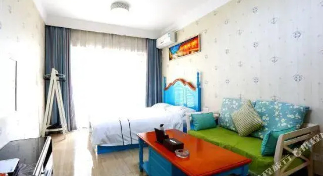 Lvxing Theme Apartment (Zhuhai Chengfeng Shuijingzuo)