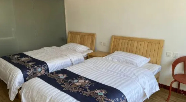 Кровать в общем номере bei'jing yiju xiaoyuan homestay