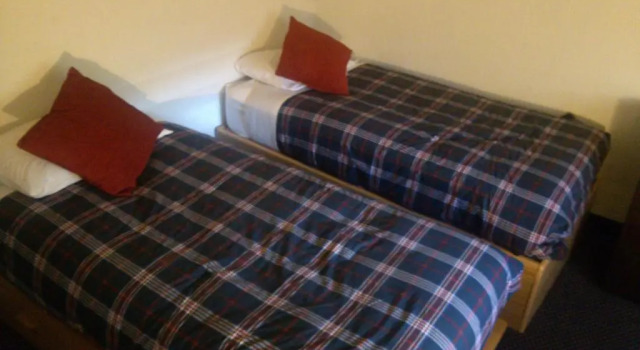 Кровать в общем номере St Moritz Lodge and Condominiums