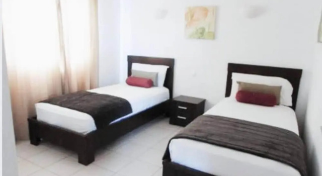 Tortuga Beach Lovely 2 bed Apartment and Gardens, Забронировать Апартаменты/квартира Отели Санта-Мария с парковкой, рядом с Дом культуры Фунана, Парковка