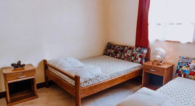 Кровать в общем номере Mkoani Homestay