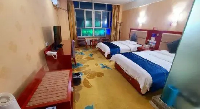 Huyang Business Hotel, Boek Hotel Ruoqiang Xinjiang