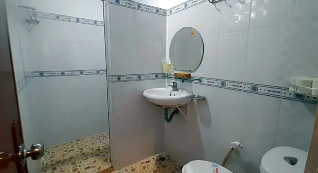 Кровать в общем номере Huynh Lac Can Tho Hotel