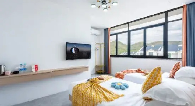 Семейный люкс с 2 комнатами sanya Green Homestay(Nanshan Temple Branch)