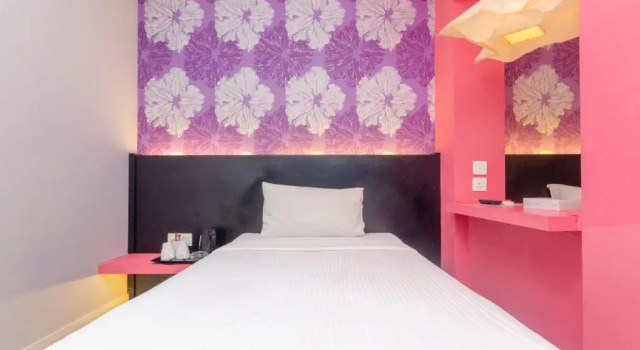 O podwyższonym standardzie trzyosobowy pokój Rooms Boutique Hotel