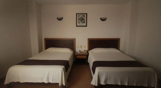 Четырёхместный номер Standard Hotel Plaza Independencia