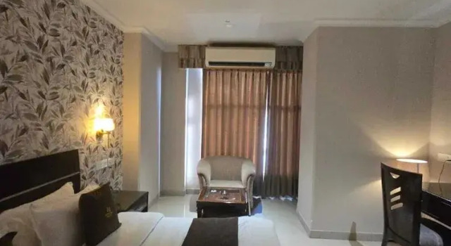 Кровать в общем номере Hotel Supreme Suites Ludhiana