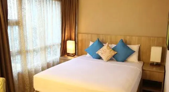 Номер Deluxe Grand Tropic Suites Hotel