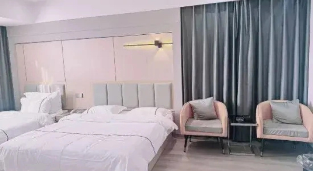 Семейный люкс Pingguo Hotel