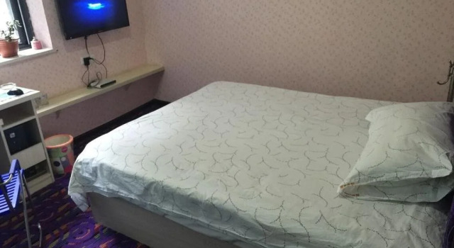 Chuxing Hotel, Rezervovat Hotel Xiangyang Čína