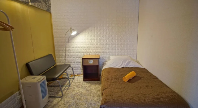 Кровать в общем номере The Hakuba Station Room