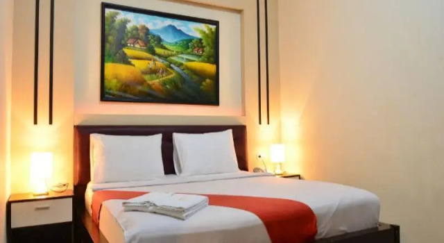Номер Deluxe OYO 920 Gajah Mada Hotel