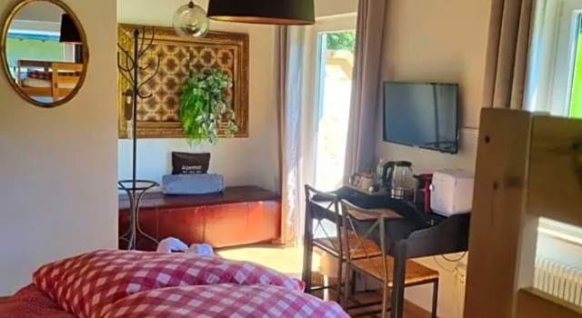 Четырёхместный номер Deluxe Boutique Hotel Alpenhof