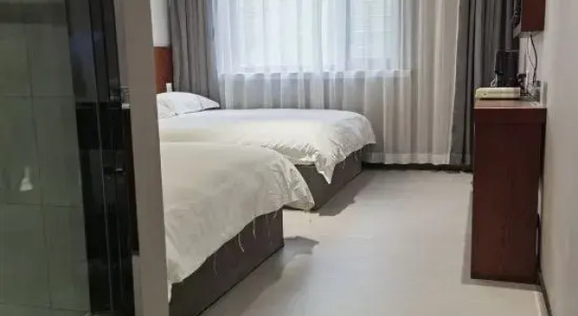 Кровать в общем номере Madiel Su Hotel