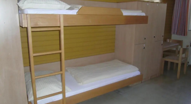 Кровать в общем номере (мужской номер) Jugend- und Familiengästehaus Heiligenblut