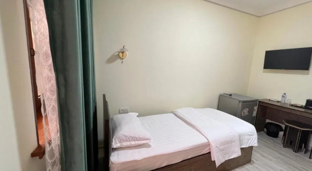 Standard quarto Usmon Khuja