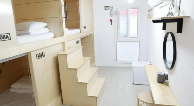 Кровать в общем номере Minihotel Poongdaengi