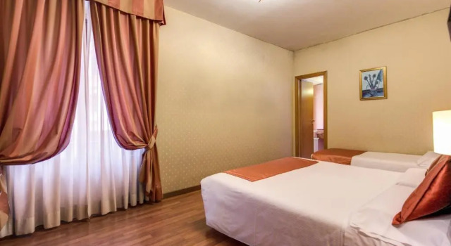 Четырёхместный номер Flower Garden Hotel