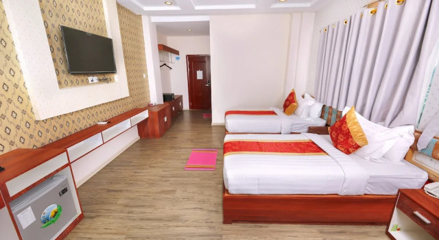 Номер Deluxe H Plus Hotel Yangon