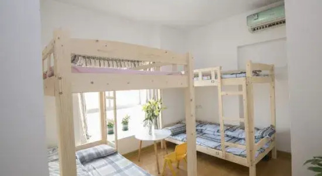 Кровать в общем номере Nanning Yuewanwan Homestay (Guangxi University Xiuling Road Subway Station)