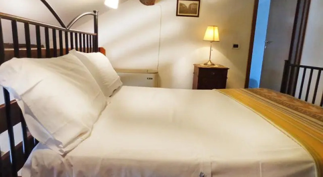 Habitación cuádruple Estándar con balcón Locanda Della Biscia
