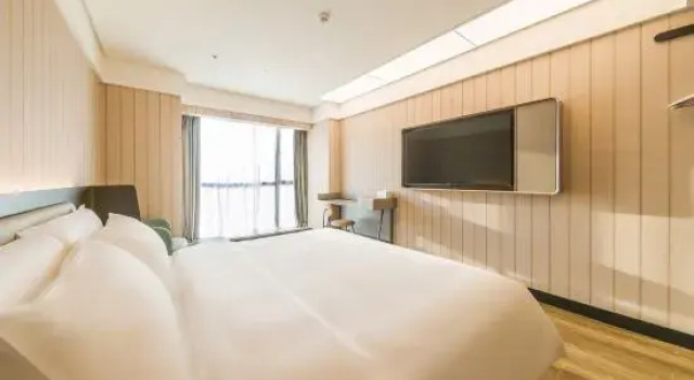 Люкс HanTing Hotel (Xiangyang Wolong Dadao Lüdi Binfencheng)