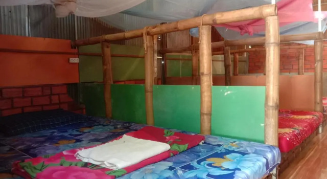 Кровать в общем номере Ratanakiri Homestay & Jungle Trek