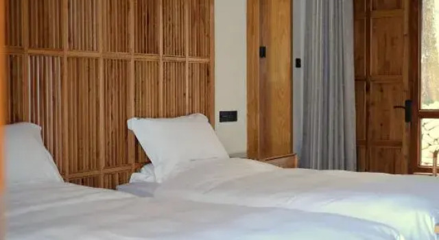 Кровать в общем номере Anji Banchá Homestay