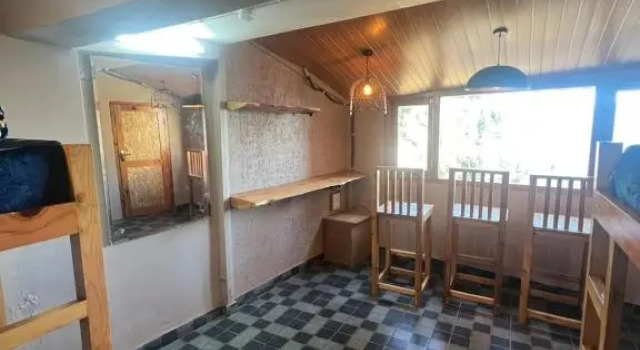 Кровать в общем номере Pahadi House