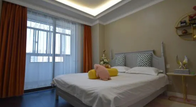 Кровать в общем номере Wangye Designer Apartment (Shanghai International Tourism Resort Store)