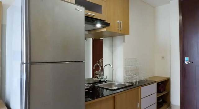 Номер Standard Serene Exclusive Modern Studio Apartment at Grand Sungkono Lagoon By Travelio