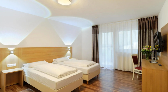 Четырёхместный номер Standard Bellevue Hotel