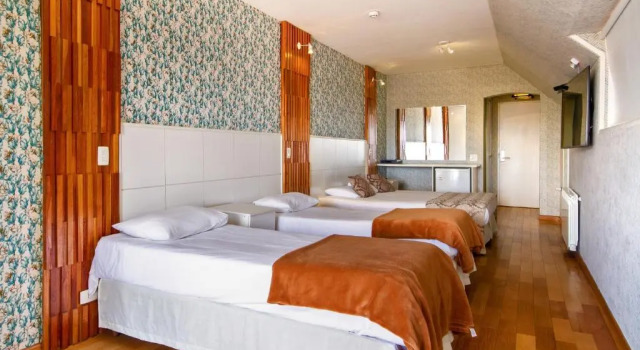 Четырёхместный номер Deluxe Chris Wellness Resort Hotel