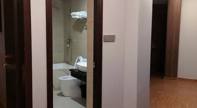 Четырёхместный семейный люкс Red Apple Hotel