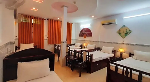 Кровать в общем номере Huynh Lac Can Tho Hotel