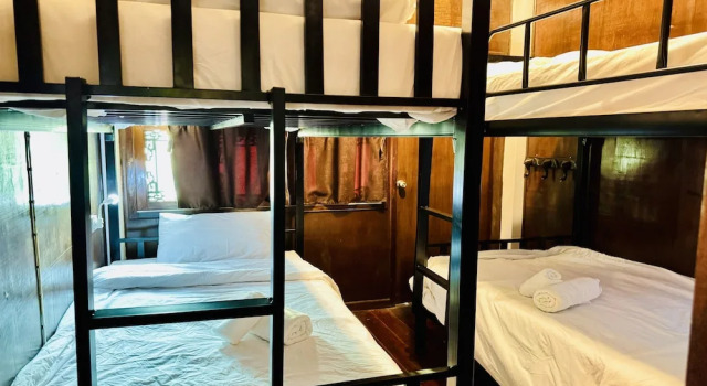 Кровать в общем номере Collection O Bupamontra Chiangmai