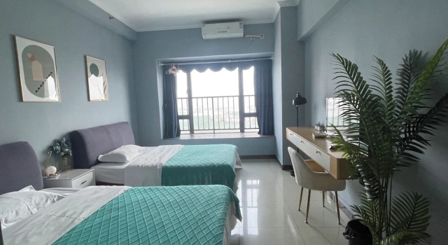 Номер Economy Yi Long International Apartment