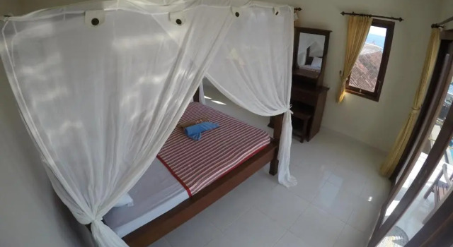 Двухместный номер Deluxe с балконом и с видом на море Homestay & Restaurant Segara Amed