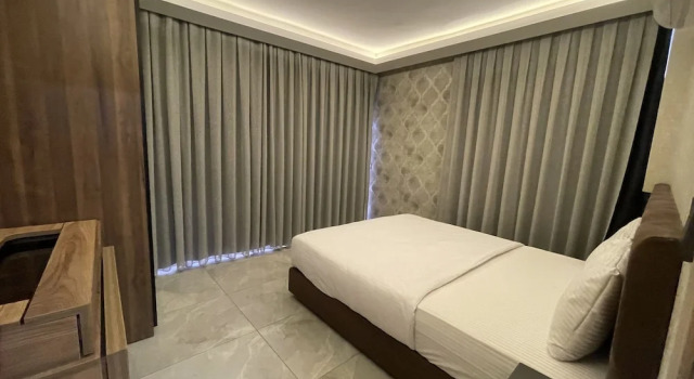 Апартаменты Le Luxe Suites Hotel