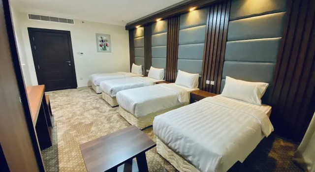 Четырёхместный номер Deluxe Itlalat Uhud Hotel - فندق إطلالة احد
