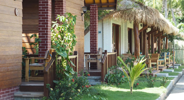 Кровать в общем номере Gili Escape Bungalows