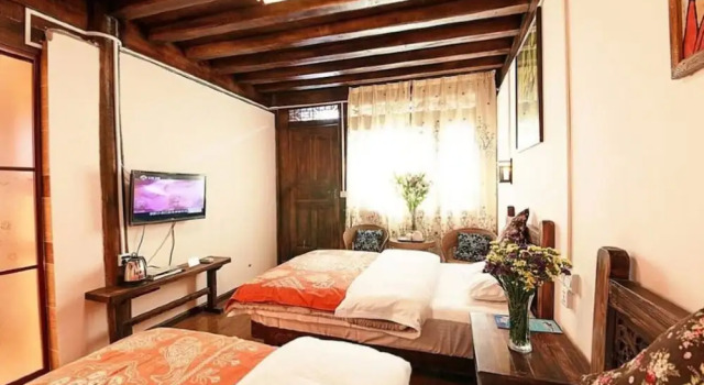 Номер Comfort Lijiang shuimuxiquan Inn