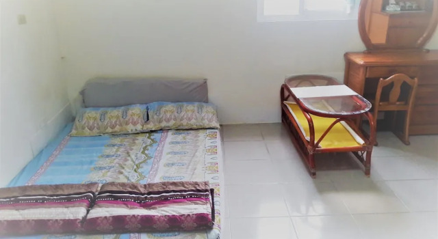 Кровать в общем номере Hai Xia Your Home